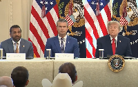 A screenshot from a video of a press conference at the East Room