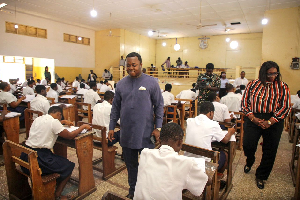 Rev. Ntim Fordjour inspecting the ongoing examination