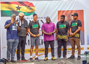 Julius Debrah pictured with MP of Madina, other party officials