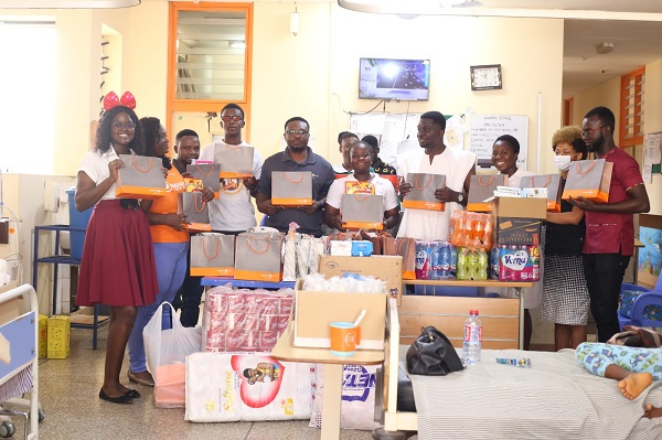 Staff and executives of Fidelity Bank captured in a photo