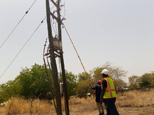VRA/NEDCo officer disconnecting a pole
