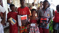 Some of the kids display their prizes