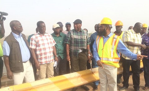 Kwasi Amoako Atta interacting with the project manager at Buipe