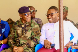 Samuel Brako interacting with  the Army Chief, Major General L.K. Gbetanu