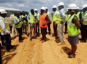 Richard Dombo briefing journalists on a 60.1km stretch of the project, with work ongoing