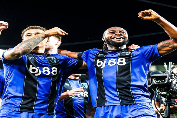 Antoine Semenyo (R) scored twice despite racial abuse