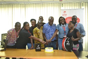 Staff of Airtel Premiere in a picture with ome customers