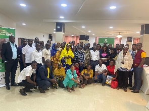 Some beneficiaries and participants in a group picture