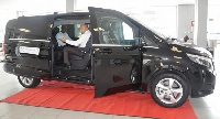 Rabie Agha (seated right) presents the unique spacious interior of the new vehicle to a guest