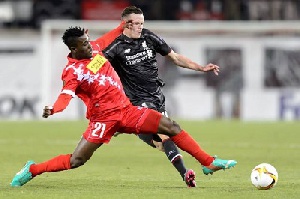 Young Ghanaian promise Ebenezer Assifuah in action against Liverpool