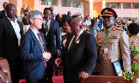 President Akufo-Addo exchanging pleasantries with an official of the EU at the 31st AU Summit