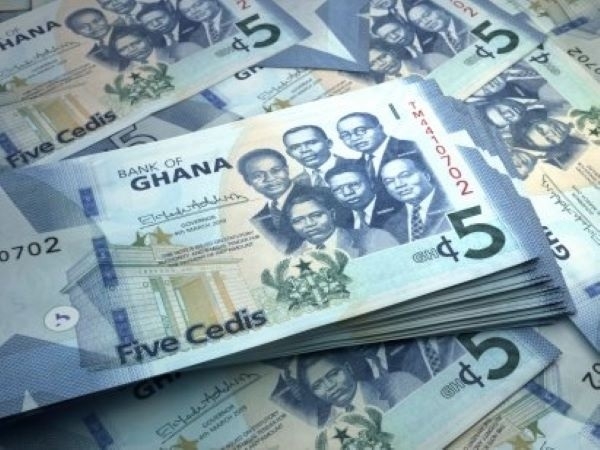 Ghana's cedi weakens into historic decline versus the US Dollar ...