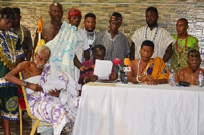 Nii Kpla Osakwno reading the statement at a press conference