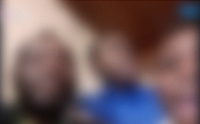 The faces of the children and their father, who was with them, were blurred to protect them