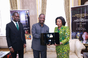 Commonwealth Receives Otumfuo Commemorative Gold Coin.jpeg