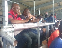 Kwesi Appiah (in red) at the WAFA Stadium to watch WAFA versus Liberty Professionals