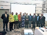 Asamoah Boateng in a group photo with staff of GPHA and GMA