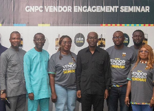 Kwame Ntow Amoah pictured with staff of GNPC