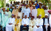 Nana kufo-Addo (seated middle) with Sheikh Osman Nuhu Sharubutu (seated 2nd and his entourage