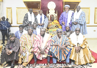 Okyenhene (wearing yellow kente) surrounded by Dagbon delegation.