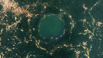 See shimmering new satellite image of Lake Bosomtwe showing gold glitters surrounding it - Earth from space