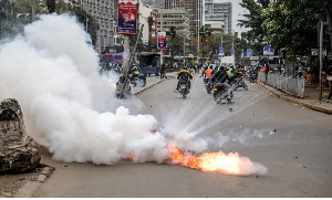 A tear gas canister explodes during renewed demonstrations in Nairobi