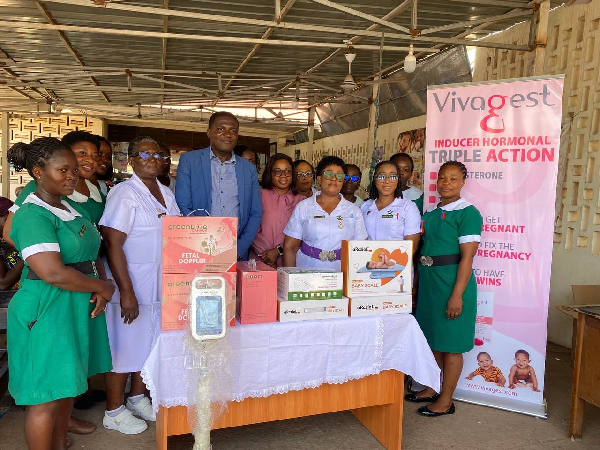 The donation includes a fetal Doppler, a baby weighing scale, and a vital signs monitor