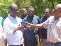 The MP speaking to the press