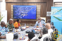 A photo of the Minister of Transport, Joseph Bukari Nikpe and other officials