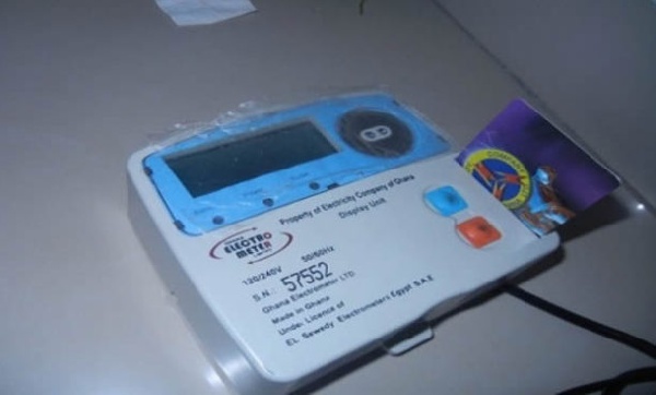 ECG card being inserted into a meter