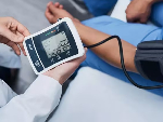 File photo of a person checking his blood pressure