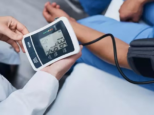 File photo of a person checking his blood pressure
