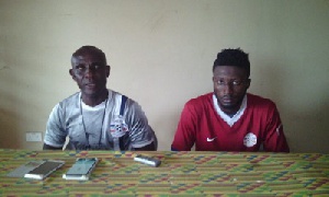 Assistant Coach of Liberty Professionals, Felix Aboagye with a Liberty player