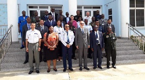 A group photograph of officers and participants at the opening ceremony