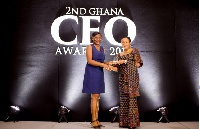 Representative of Total Ghana receiving the award