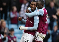 Albert Adomah joins his teammate to celebrate the goal