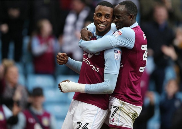 Albert Adomah joins his teammate to celebrate the goal