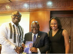 Bola Ray presented a copy of his yet to be released biography to President Akufo-Addo