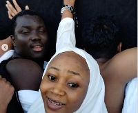 Rosemond Brown, aka, Akuapem Poloo, spotted with her hands on the Kaaba
