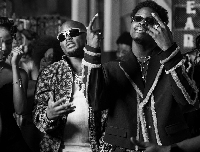 Behind the scenes picture of King Promise and Lasmid