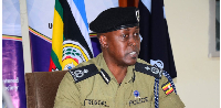 Police spokesman Kituuma Rusoke speaks to the media during a press briefing in Kampala