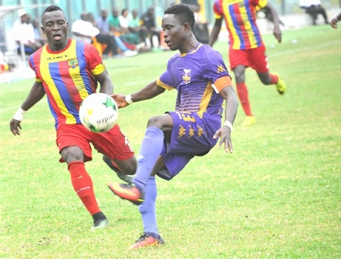Jacob Larweh on the ball against Hearts of Oak.