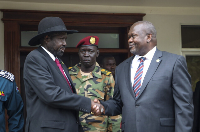 South Sudan's president Salva Kiir (left) and vice-president Riek Machar shake hands, Juba