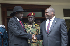 South Sudan's president Salva Kiir (left) and vice-president Riek Machar shake hands, Juba