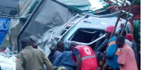 Uganda Red Cross team, police and other first responders seen during a rescue operation