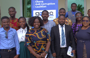 The media participants at the event in a group photo
