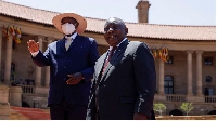 President Cyril Ramaphosa (r) & President Yoweri Museveni PHOTO | GUILLEM SARTORIO | AFP