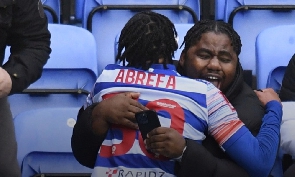 Kelvin Abrefa celebrates a goal with family member