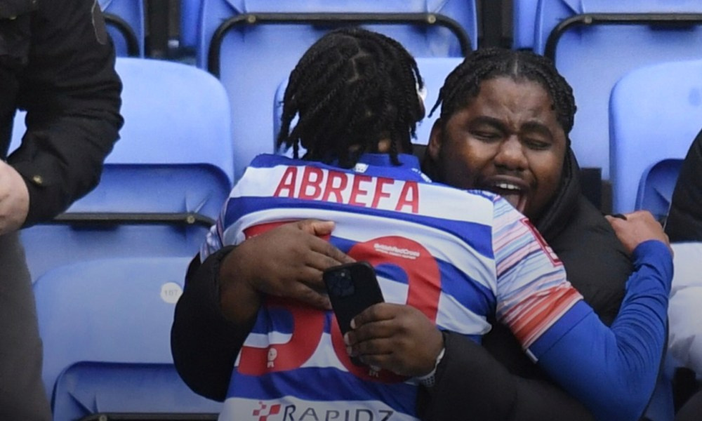 Kelvin Abrefa celebrates a goal with family member