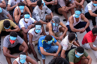 Trafficking victims wait at KK Park near the Thailand-Myanmar border